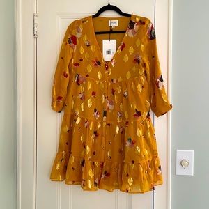 Sezane dress, yellow pattern with gold detail. New and never been worn. Size 38
